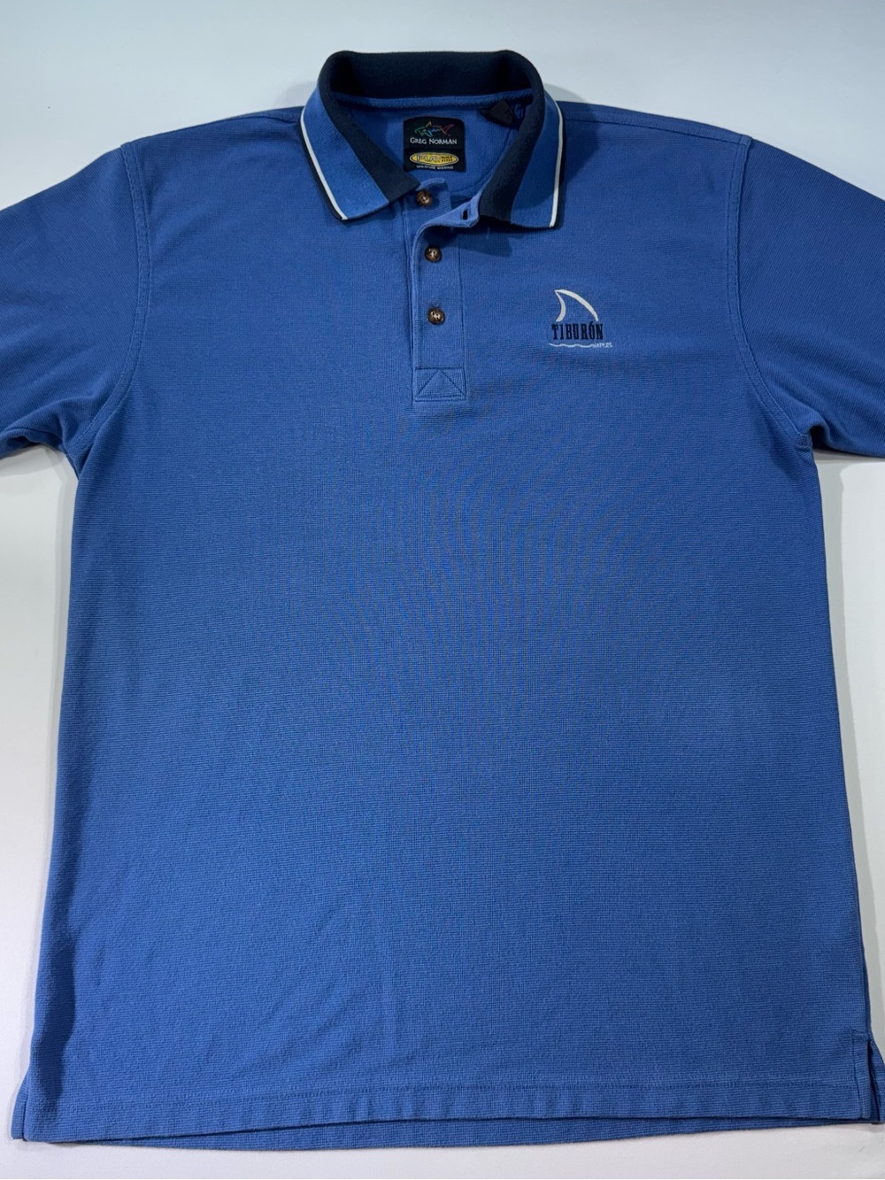 GREG NORMAN Men’s SS Polo Shirt, Medium, Blue, Shark Logo, Casual Golf